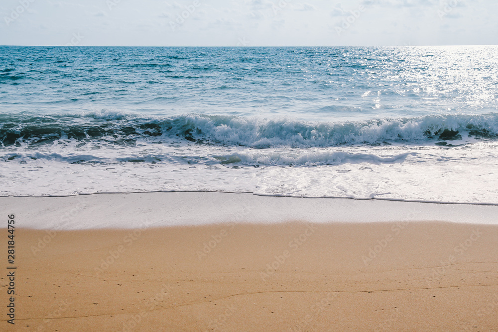 ocean blue wave on sandy beach, Summer background. ocean blue wave on sandy beach, Summer background.