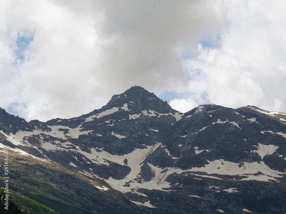 The Alps with its woods and glaciers near Monte Rosa and the town of Macugnaga, Italy - July 2019.