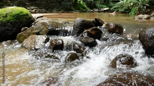 small waterfall in the forest photo