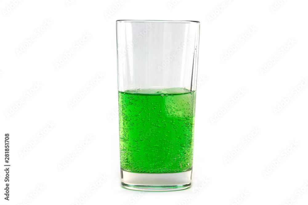 Natural green sparkling Soda in Glass with Ice isolated on white Background Natural green sparkling Soda in Glass with Ice isolated on white Background