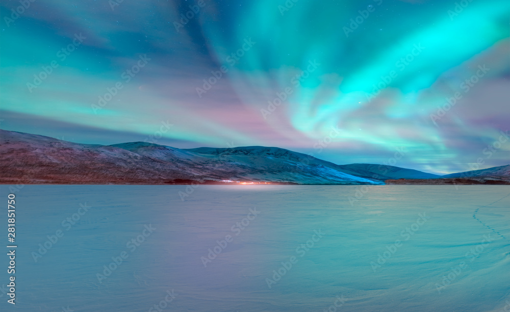 Northern lights (Aurora borealis) in the sky with super full moon
