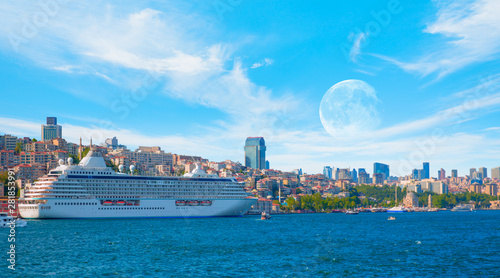 Luxury cruise ship in Bosporus with full moon - Istanbul, Turkey "Elements of this image furnished by NASA