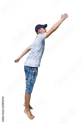 Side view full length portrait of a casual young man wearing a hat hand stretched trying to reach to something isolated over white background. photo