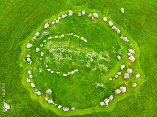 Ballynoe stone circle, a prehistoric Bronze Age burial mound surrounded by a circular structure of standing stones, County Down, Nothern Ireland photo