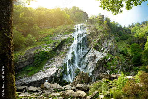 Majestic water cascade of Powerscourt Waterfall, the highest waterfall in Ireland. Tourist atractions in co. Wicklow, Ireland. photo