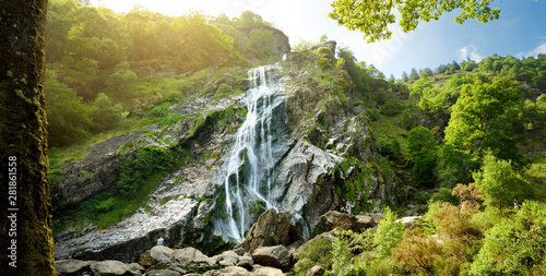 Fototapeta Naklejka Na Ścianę i Meble -  Majestic water cascade of Powerscourt Waterfall, the highest waterfall in Ireland. Tourist atractions in co. Wicklow, Ireland.