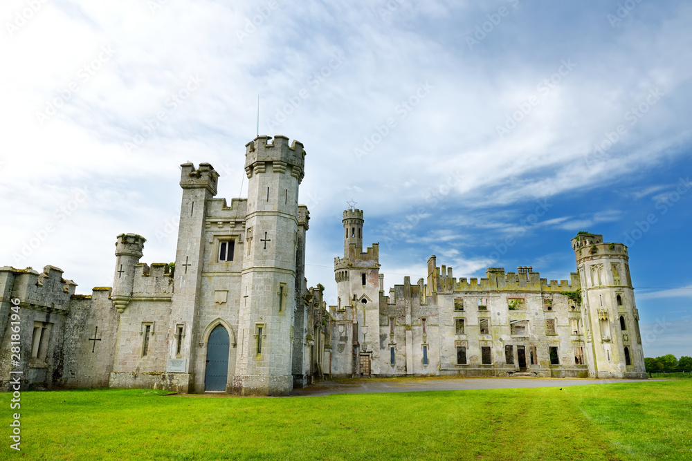 The towers and turrets of Ducketts Grove, a ruined 19th-century great house in County Carlow, Ireland.