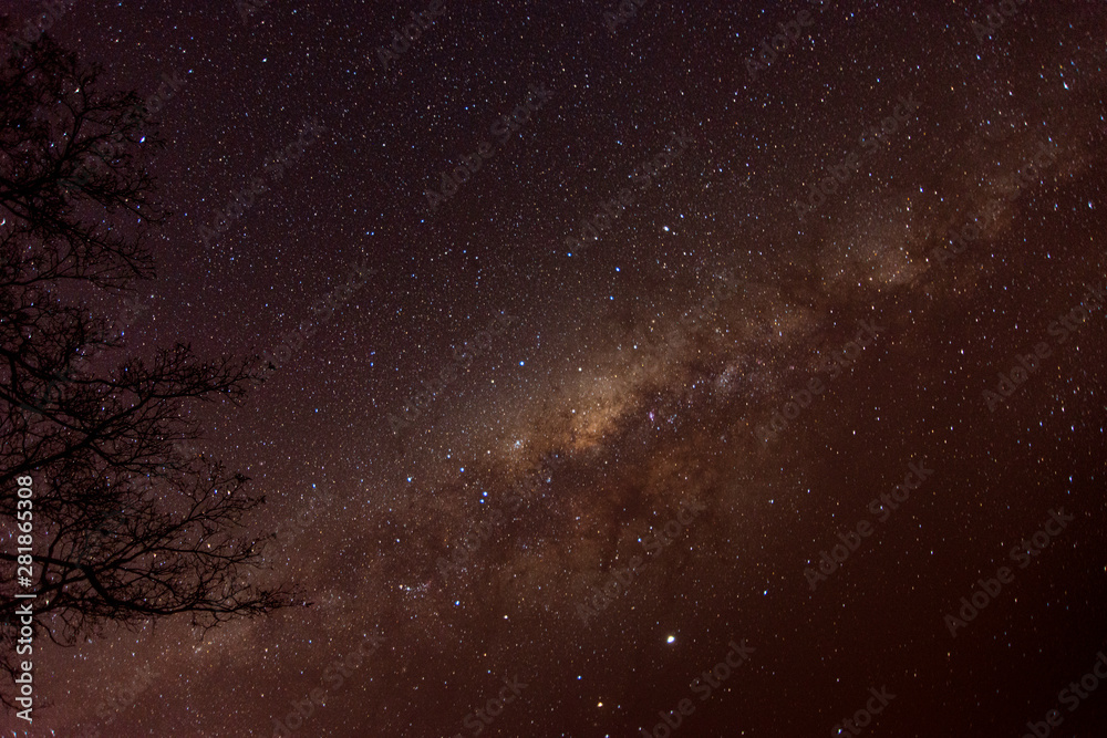 milky way in yellow with visible galactic center.