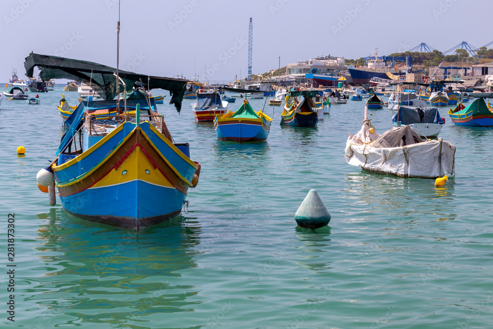 Obraz premium Marsaxlokk. Traditional boats Luzzu in the old harbor.
