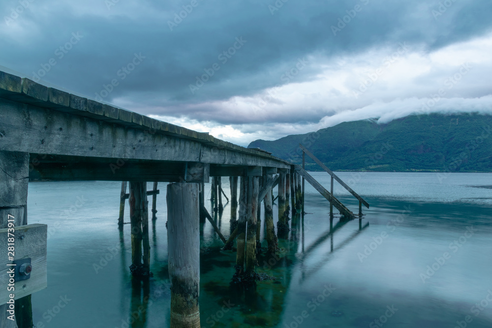 Pier in the lake at dusk