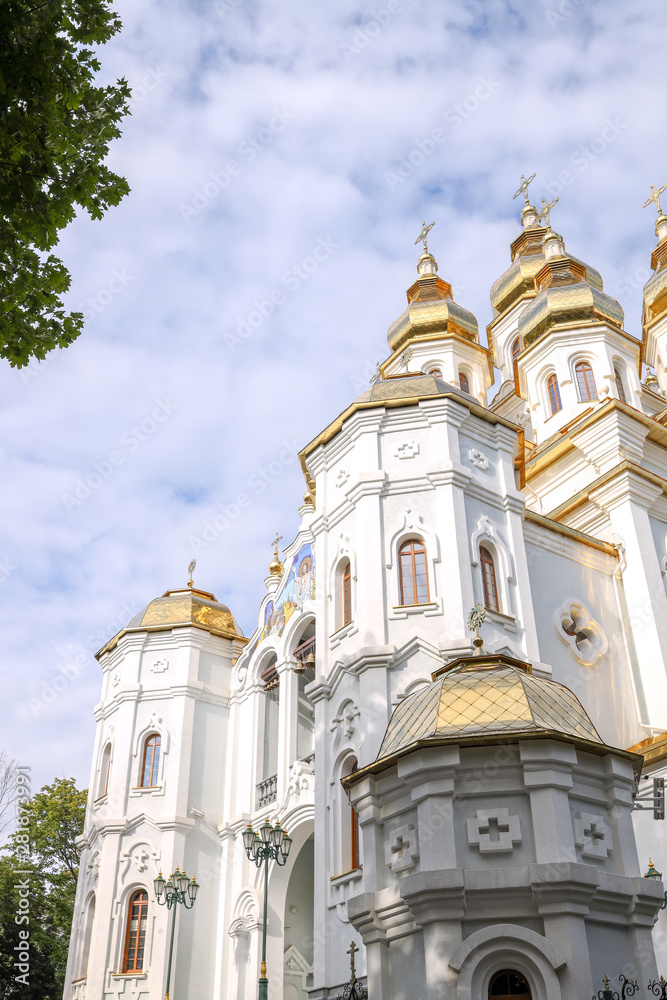 Temple of The Myrrh-Bearers. Orthodox church with a golden shining dome in the city of Kharkiv