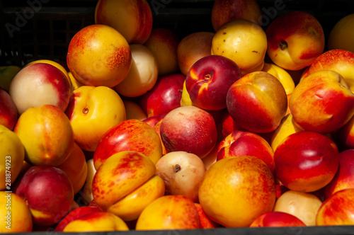 bright peaches in the bazaar, sunny day
