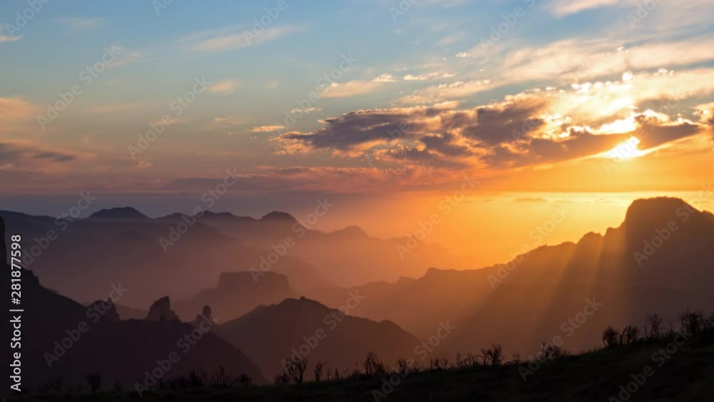 Day to night sunset hyper lapse over volcanic caldera of Tejeda, Gran Canaria, Canary islands, Spain.