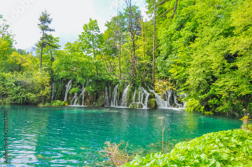 Beautiful Plitvice Lakes National Park in Croatia during the summer. Waterfalls and lakes complete this lush wonderland.