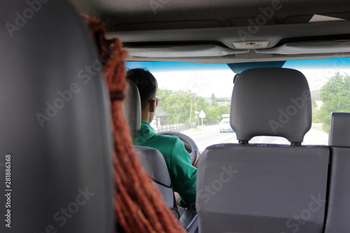 The driver carries a passenger.