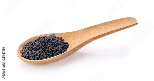 black sesame in  wood spoon isolated on white background. full depth of field