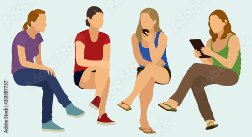 Casually Dressed Teens or Young Adult Women Sitting Together