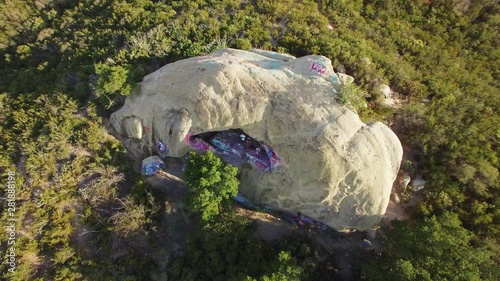 360 Aerial View of Rock Covered in Graffiti | Jim Morrison Cave in Malibu, California photo