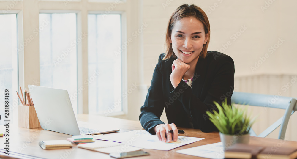 Confident young asian businesswoman smiling Confident young asian businesswoman smiling