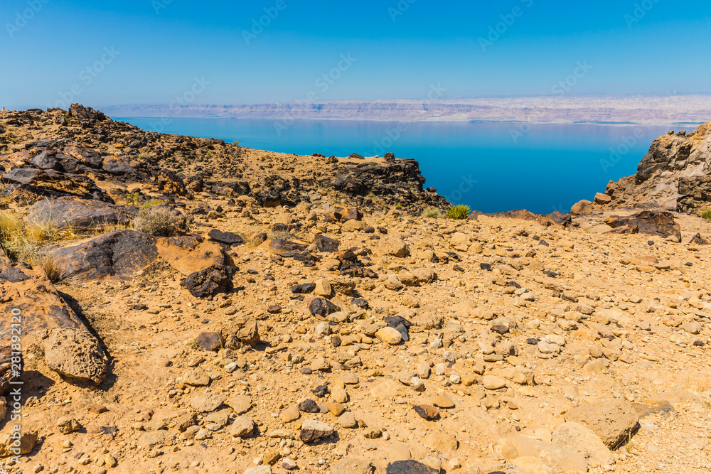 View from the Zara trail, near the Panorama Dead Sea Complex in Jordan. Zara  Cliff Walk offers stunning views of the Dead Sea coast. Stock Photo | Adobe  Stock