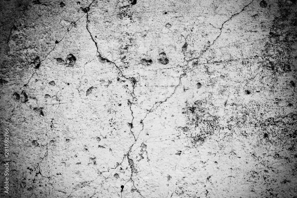 Obraz premium Texture of a concrete wall with cracks and scratches which can be used as a background