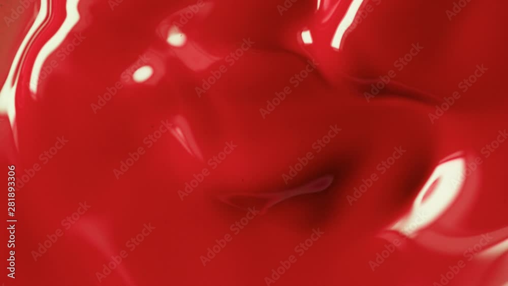 Super slow motion of mixing red paint. Abstract background. Filmed on high speed cinema camera, 1000 fps. Super slow motion of mixing red paint. Abstract background. Filmed on high speed cinema camera, 1000 fps.