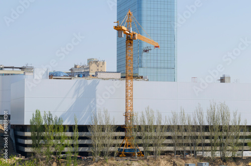 Wallpaper Mural Construction of an office building with multi-level parking with a crane Torontodigital.ca