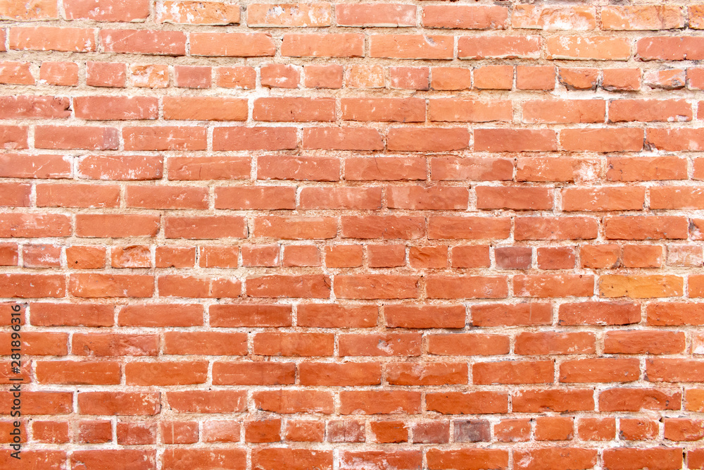 Obraz premium A rustic masonry brick wall background