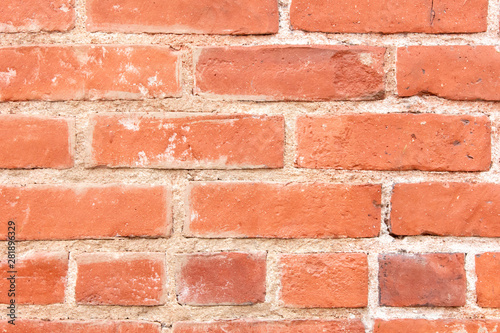 A rustic red brick background