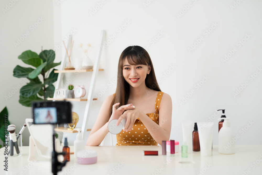 Asian beauty blogger recording video at home Asian beauty blogger recording video at home