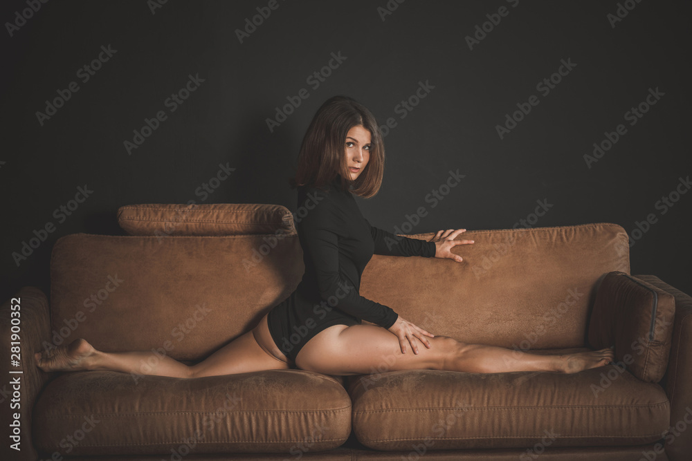 Sexy young woman at dark interior. psychology desires Stock Photo | Adobe Stock