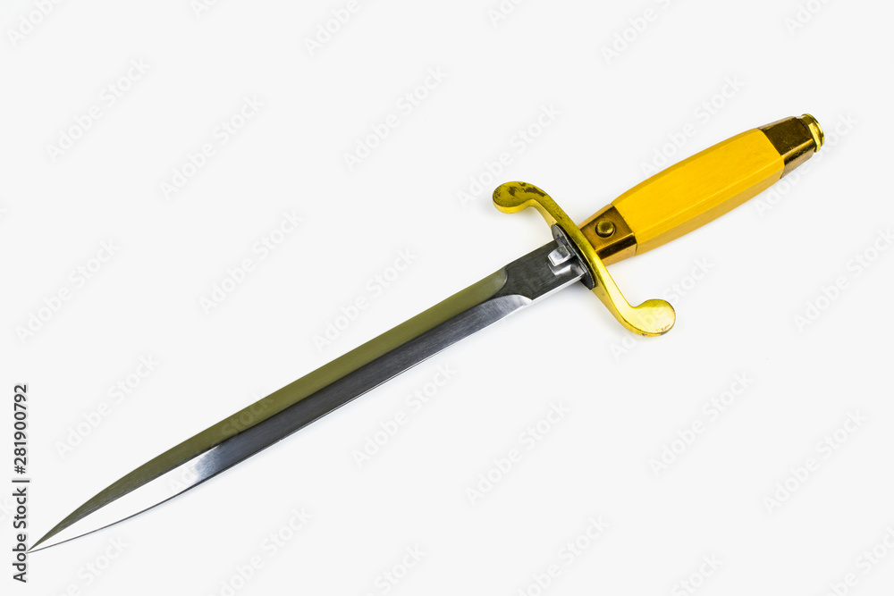 Dirk with a yellow handle isolated on a white background. Dirk with a yellow handle isolated on a white background.