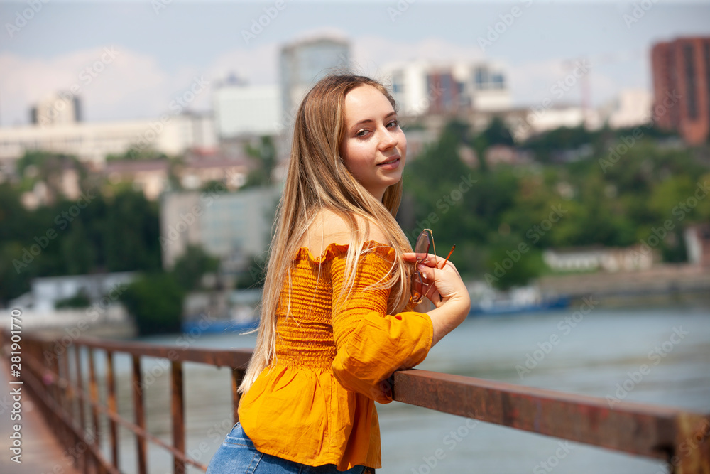 Beautiful Young Woman Outdoor. Enjoy Nature. Healthy Smiling Girl in the Spring Park.