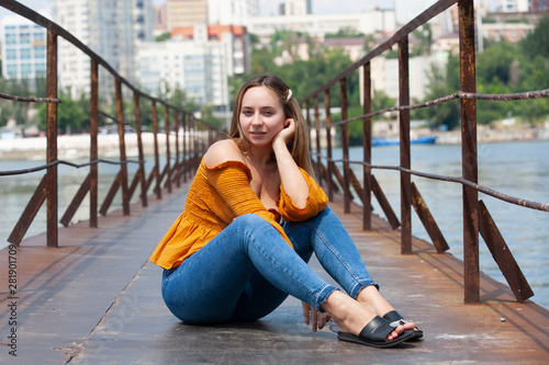 Beautiful Young Woman Outdoor. Enjoy Nature. Healthy Smiling Girl in the Spring Park.