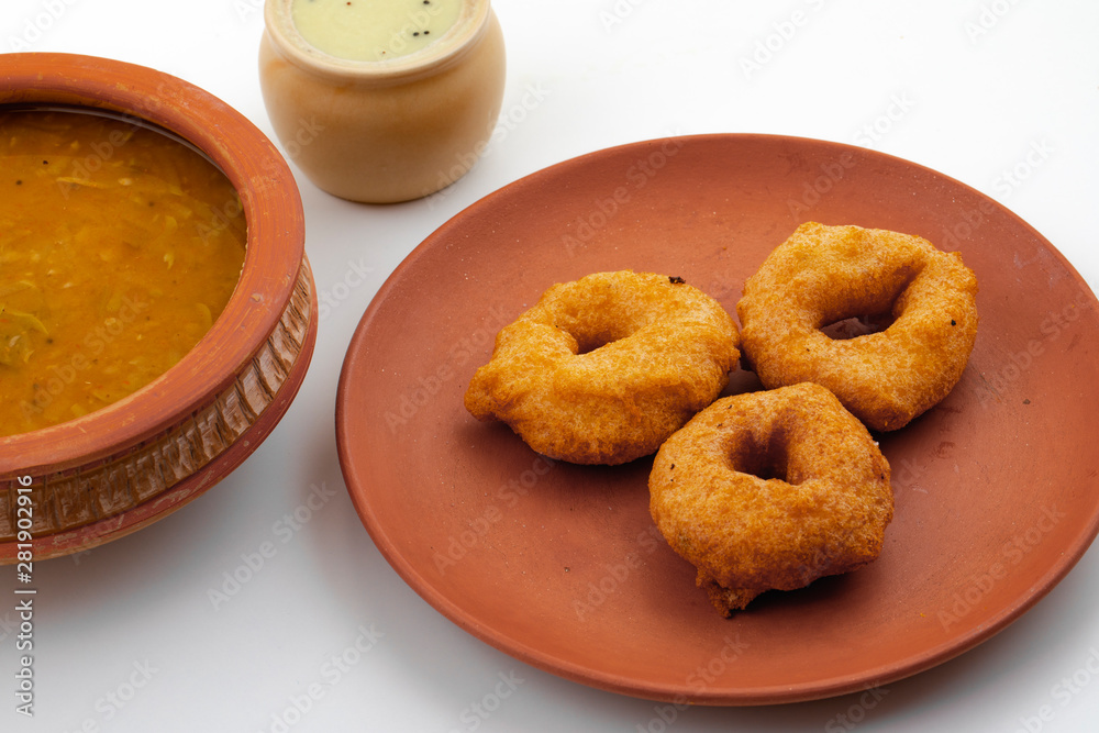 South Indian Popular Breakfast Vada Served With Sambar And Coconut Chutney Also Know as Vadai, Vade or Medu Vada