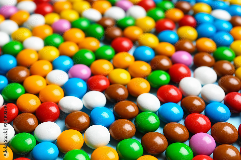 Many colorful delicious candies as background, closeup Many colorful delicious candies as background, closeup