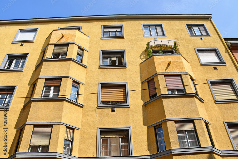 Naklejka premium Bauhaus style apartment building in the city