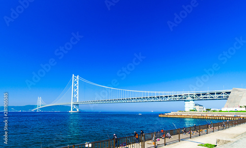 Landscape of family angler in the background of Akashi Kaikyo Bridge in the summer morning