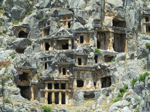 Ancient lycian Myra rock tomb ruins in Demre, Antalya.