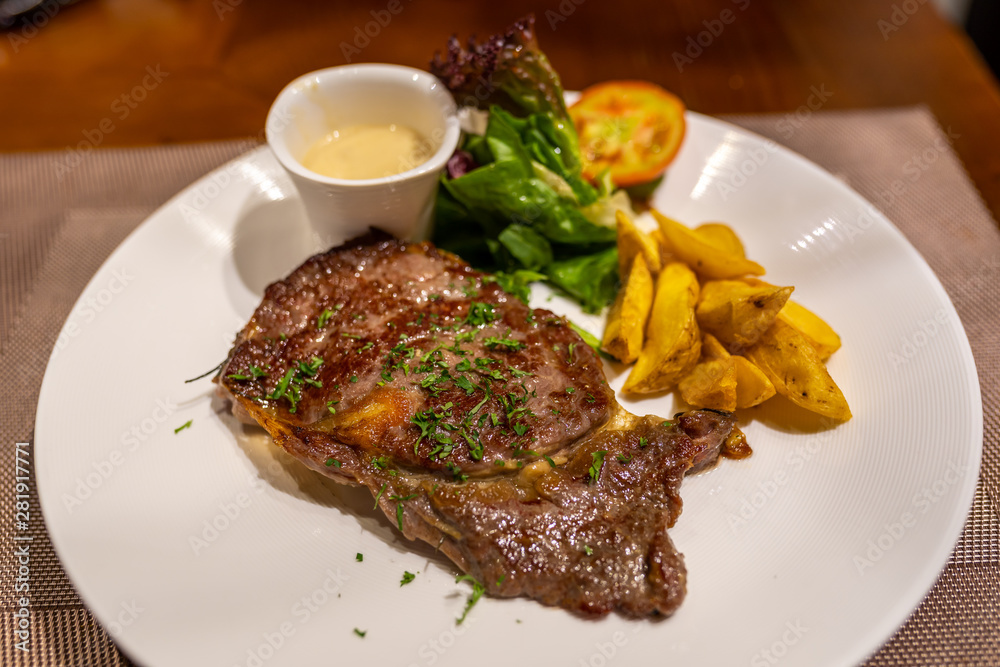 Beef steak with creamy mushroom sauce and roasted potatoes Beef steak with creamy mushroom sauce and roasted potatoes