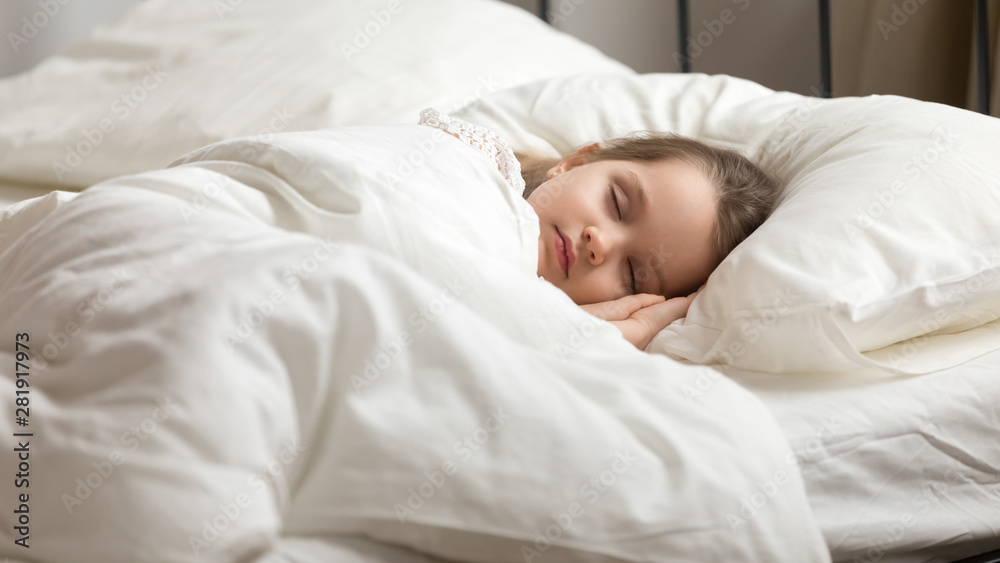 Sweet little kid girl having healthy day nap in bed Sweet little kid girl having healthy day nap in bed