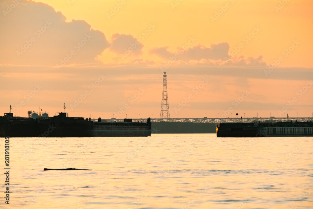 View of the Amur bridge in Khabarovsk during sunset. Russia, Far East.