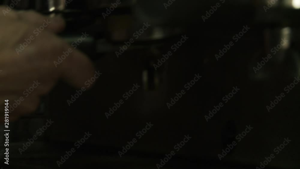 Man Making Fresh Coffee with Coffee Machine. Man Making Fresh Coffee with Coffee Machine.