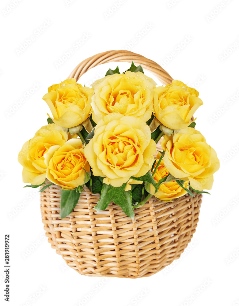 Wicker basket with yellow roses on a white background Wicker basket with yellow roses on a white background