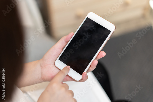 Girl pointing finger on screen smartphone