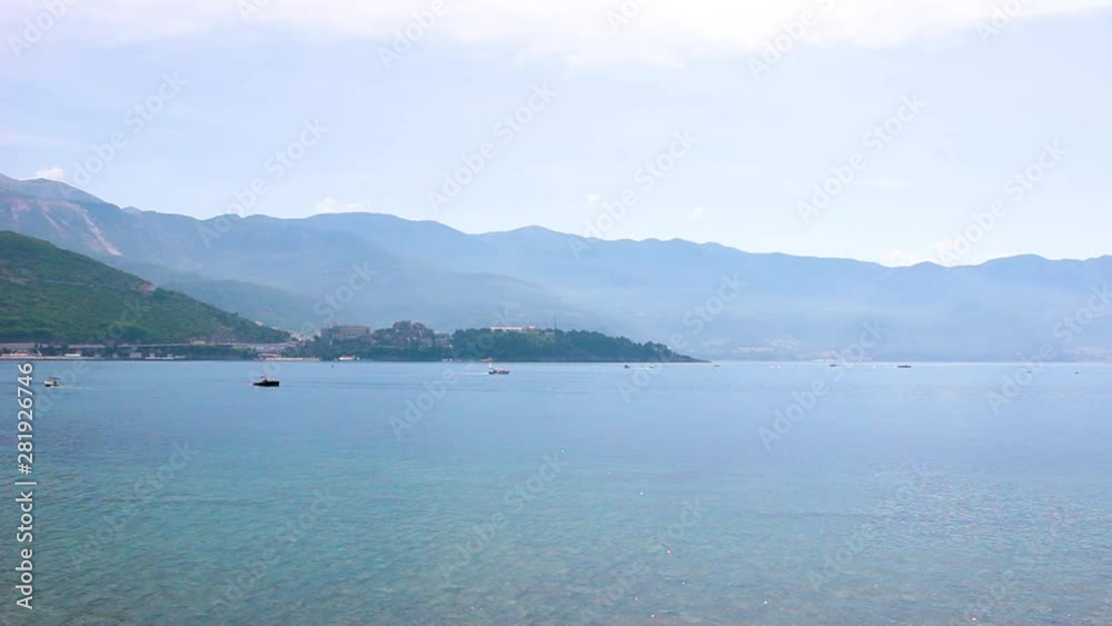 Summer seascape, Sveti Nikola island in Adriatic sea at Montenegro, panoramic motion Summer seascape, Sveti Nikola island in Adriatic sea at Montenegro, panoramic motion