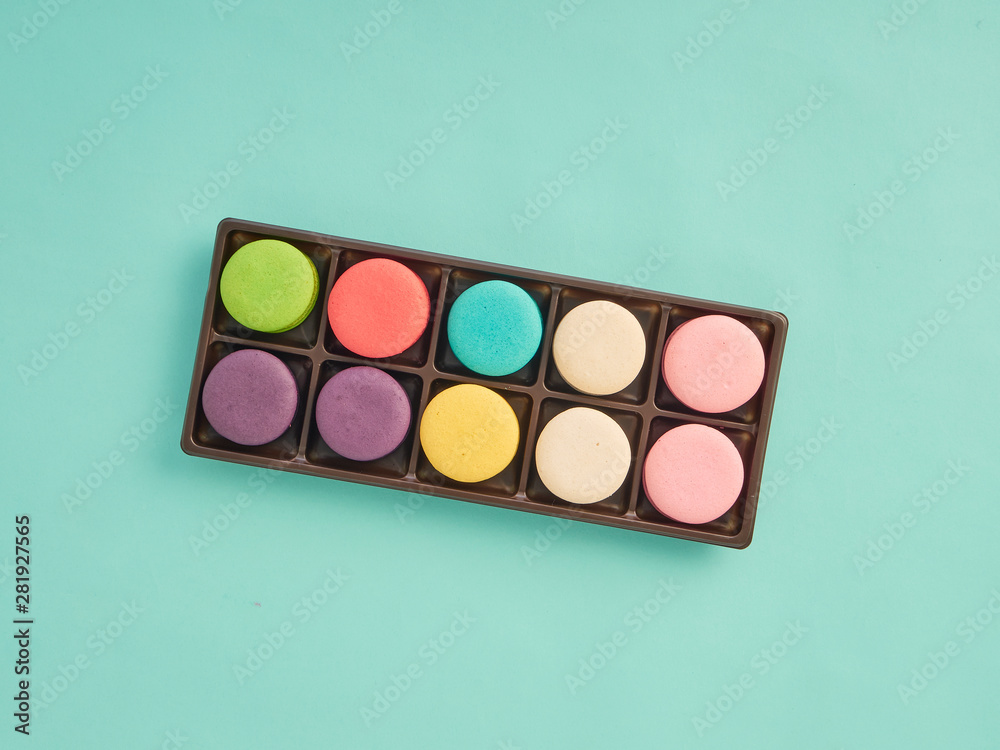 Macarons pattern on pastel blue background Macarons pattern on pastel blue background