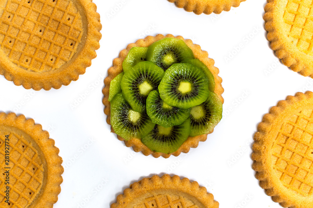 Golden biscuits with kiwi isolated on white Golden biscuits with kiwi isolated on white