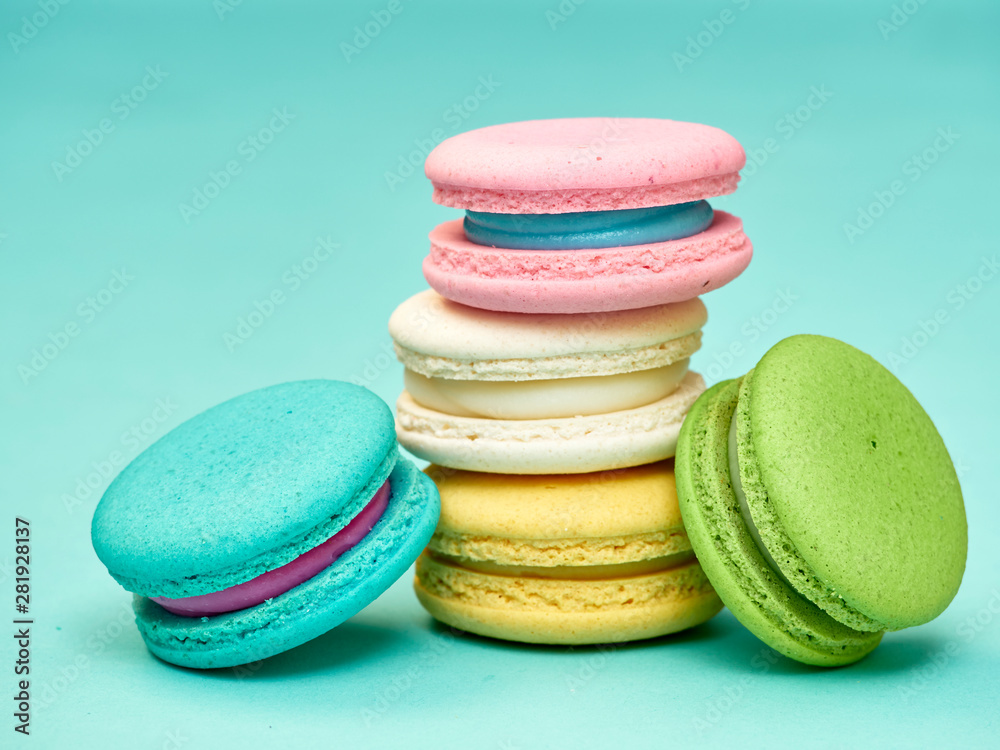 Macarons pattern on pastel blue background Macarons pattern on pastel blue background