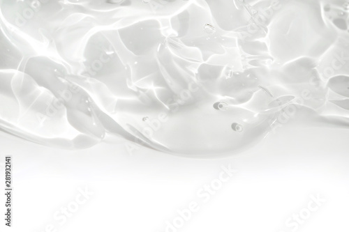 transparent gel dripping, white background